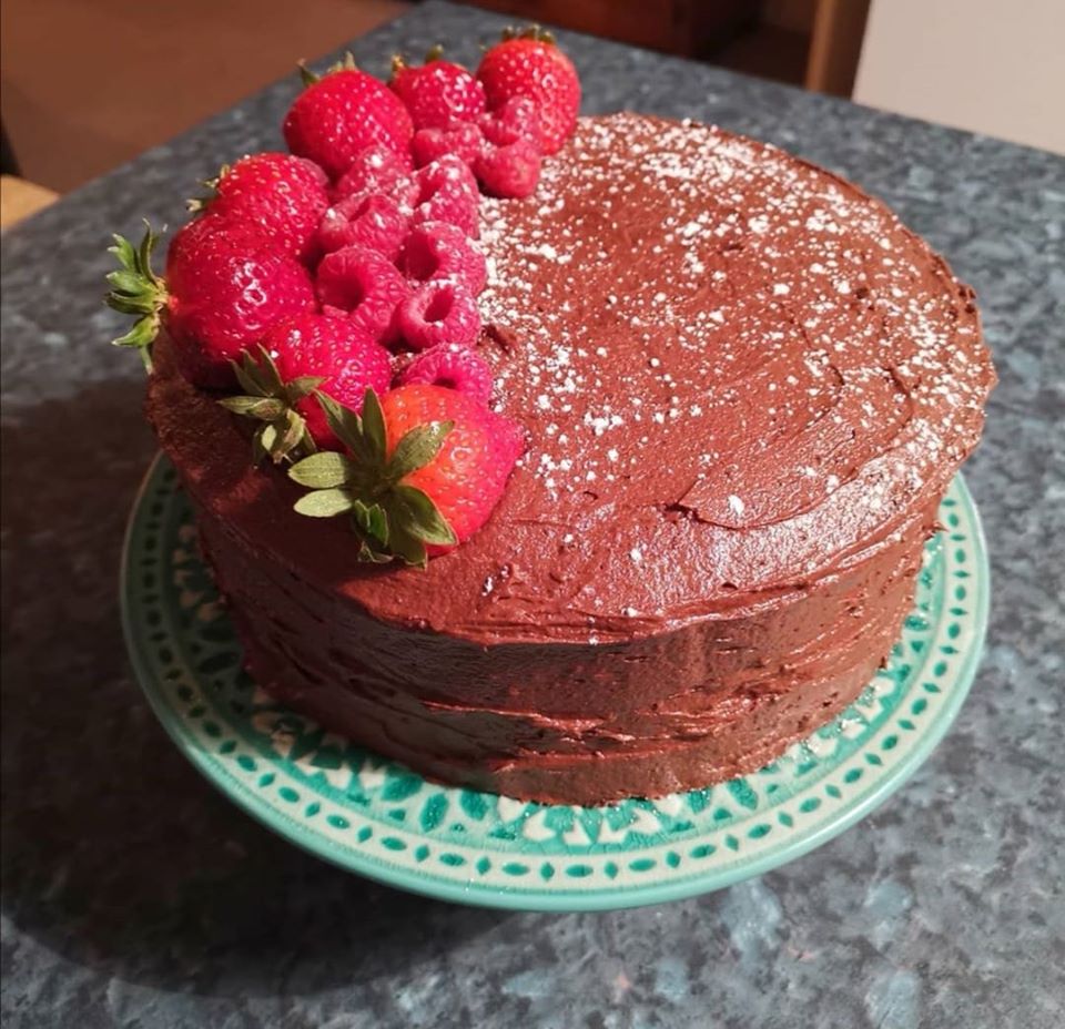 Chocolate cake with raspberries and strawberries