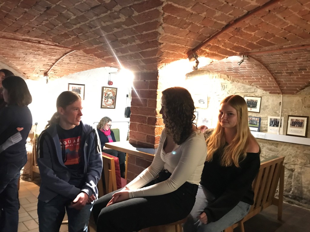 Three students practise speaking German at Radley College event